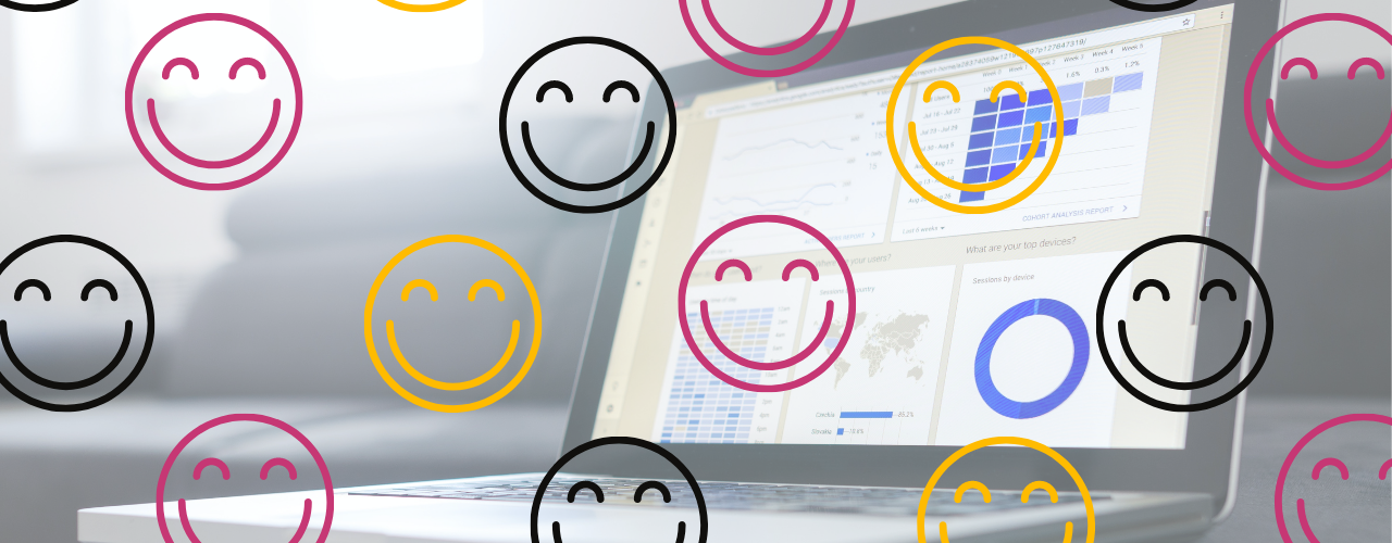 smiley faces on surrounding a laptop screen with graphs
